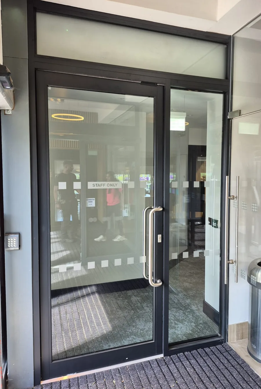 Commercial aluminium glazed door with access control