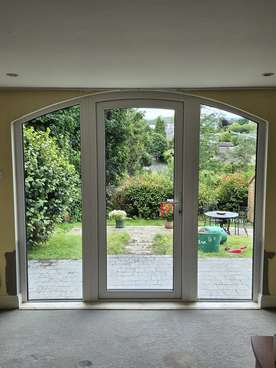 Arched uPVC door with full-height sidelights fitted by O'Sullivan Glazing in Co. Wicklow