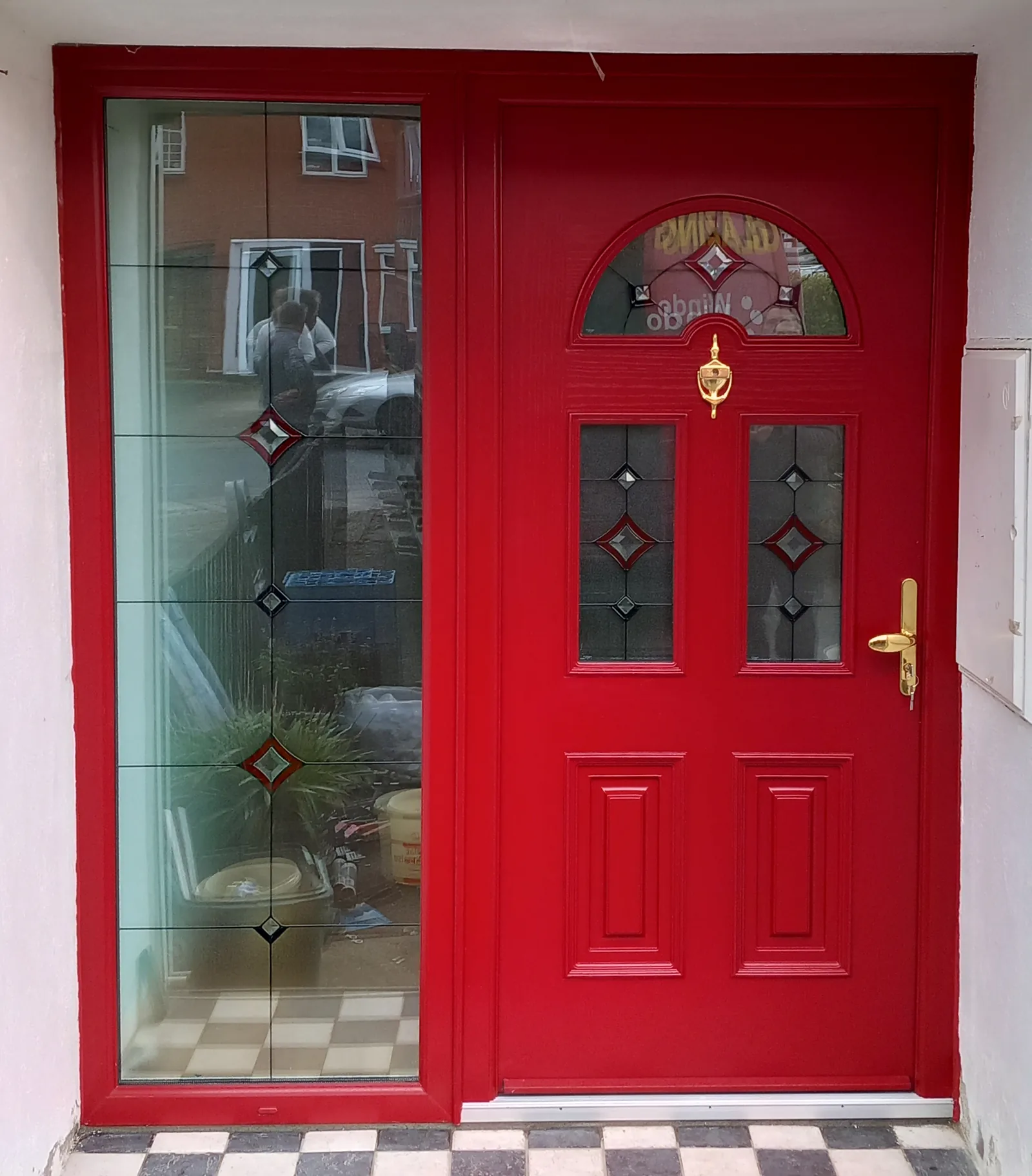 New composite front door fitted on a family home